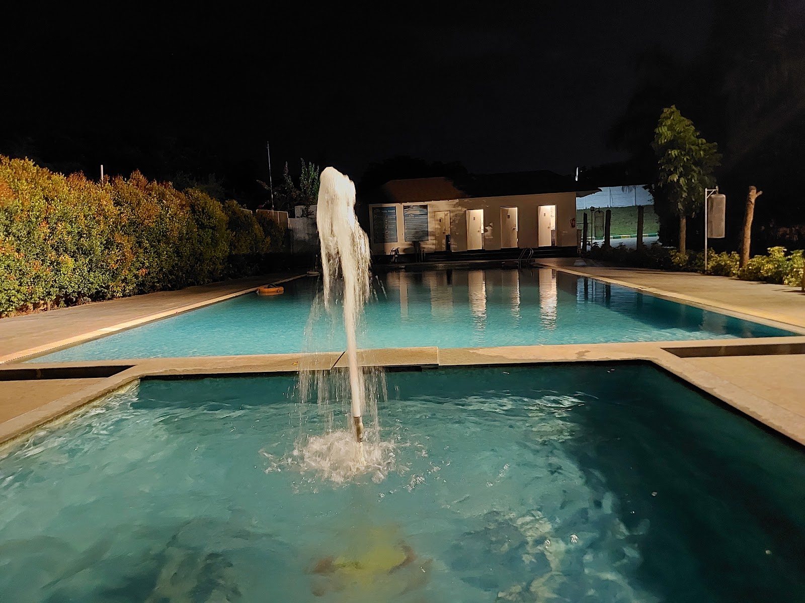 Pool at night at Gubbi Goodu